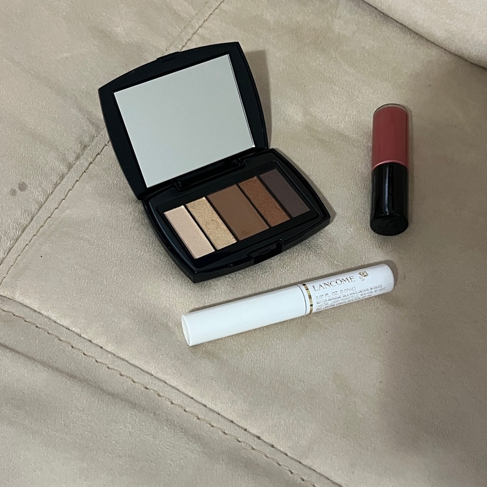 Lancome Eyeshadow Palette and Lip Gloss & mascara primer. All offer welcome.